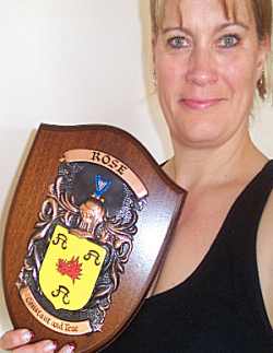 Claire with her Family Crest Plaque
